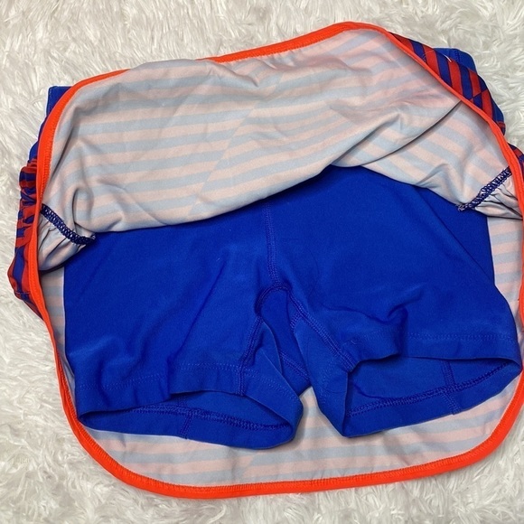 Nike red & blue running shorts with skirt overlay - Picture 7 of 7